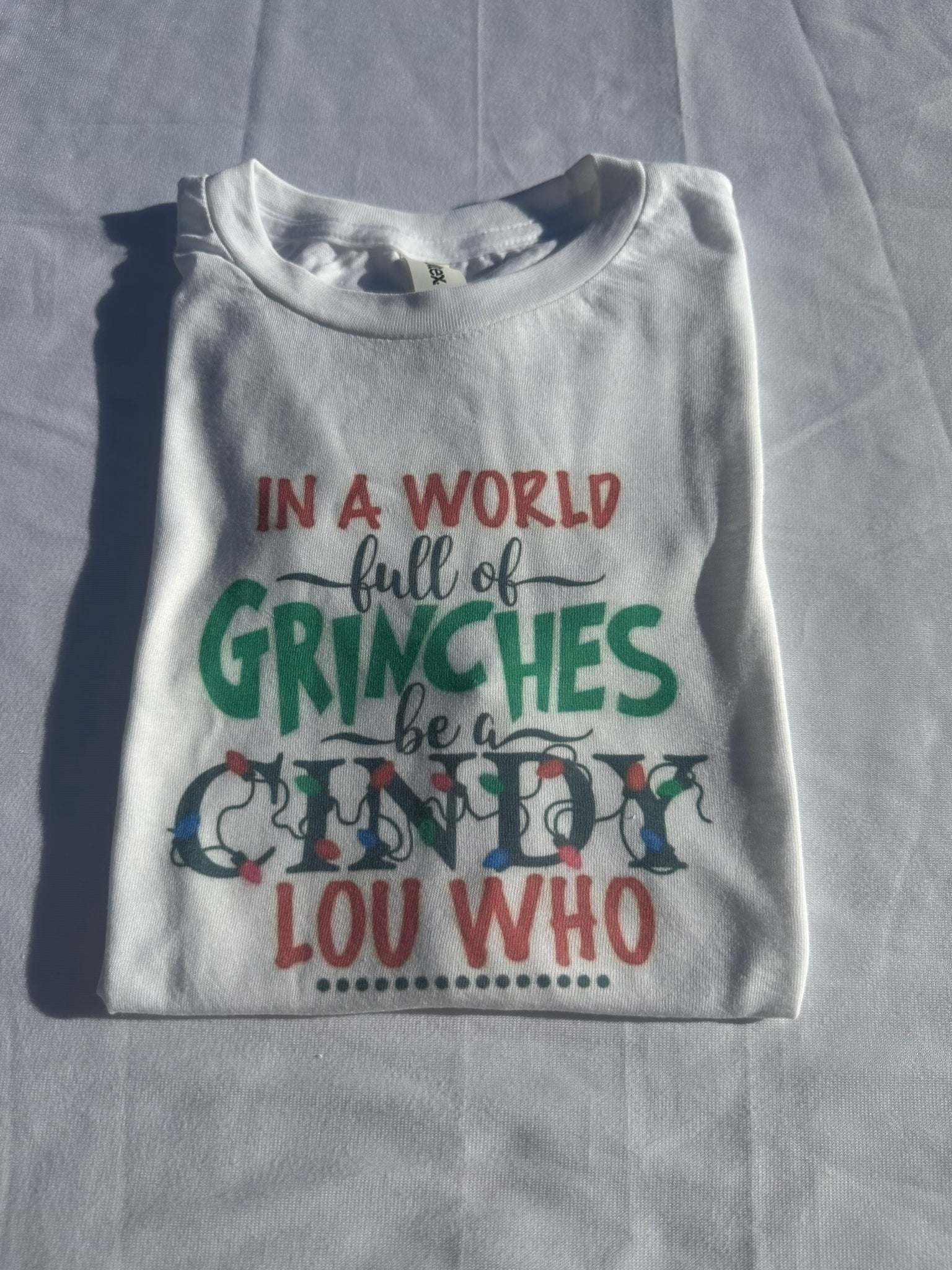 In a World Full of Grinches be a Cindy Lou Who Shirt